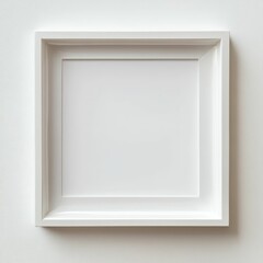 Blank white frame on textured wall.