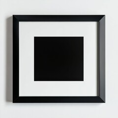 Black frame, white mat, black insert, wall.
