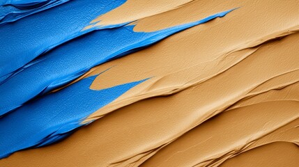 Obraz premium a close up of a blue and brown paint brush stroke