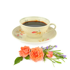 Coffee in vintage porcelain cup and bouquet of flowers isolated on white background.