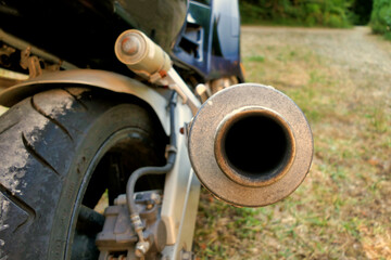 Close up of a motorbike carbon fibre exhaust