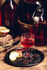 Glass of homemade currant nalivka