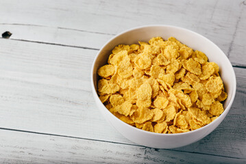 White bowl of corn flakes