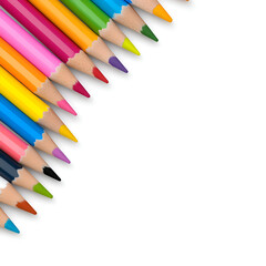 Fototapeta premium A vibrant array of colored pencils arranged in a row against a white background.
