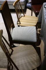 Artistic Composition Featuring Stacked Chairs in Beautiful Natural Light and Shadows