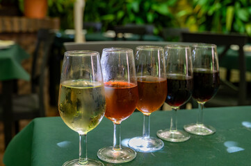 Flight of five sherry wine from barrels, fino, manzanilla, olorosso, amontillado, pedro ximenez jerez wines in old tavern, wine tasting, Sanlucar de Barrameda, Cadiz, Andalusia, Spain