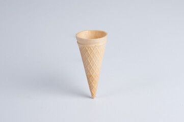 Image of ice cream cones and wafers placed 
on a white background.