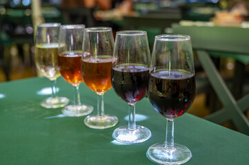 Flight of five sherry wine from barrels, fino, manzanilla, olorosso, amontillado, pedro ximenez jerez wines in old tavern, wine tasting, Sanlucar de Barrameda, Cadiz, Andalusia, Spain