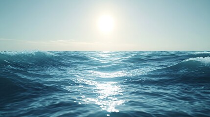 Gentle waves glisten under bright sunlight, creating serene ocea