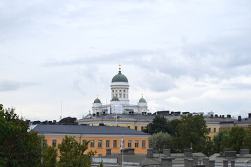 Fototapeta premium View to the Helsinki Cathedral above cityscape and roofs