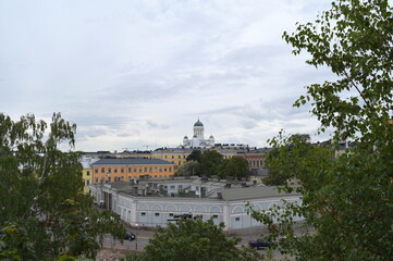 View to the Helsinki Cathedral above cityscape and roofs