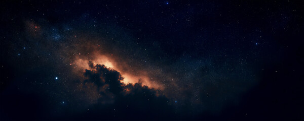 Fototapeta premium Distant view of the Milky Way under a starry sky, featuring a faint cloud and a mysterious glow on some stars. The dark blue and black tones create a cinematic atmosphere.