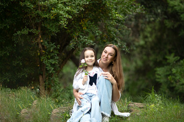 parent and child, a tender moment between mom and daughter