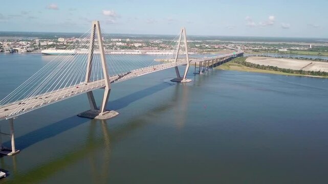 Aerial fly by of the Ravenel Bridge with the city of Charleston, South Carolina in the background.