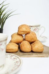 Odading, a box-shaped fried bread that expands like a pillow, with a like brown crispy outer shell...
