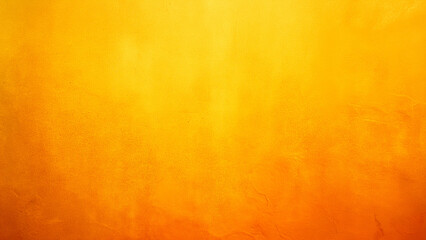Vibrant abstract background with rich shades of orange and yellow, creating a warm and inviting atmosphere. The textured wall surface is illuminated with soft lighting.