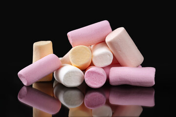 Marshmallow. Pile of marshmallows on a dark