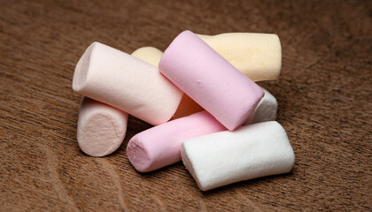 Marshmallow. Heap of marshmallows on a wooden surface. Selective focus