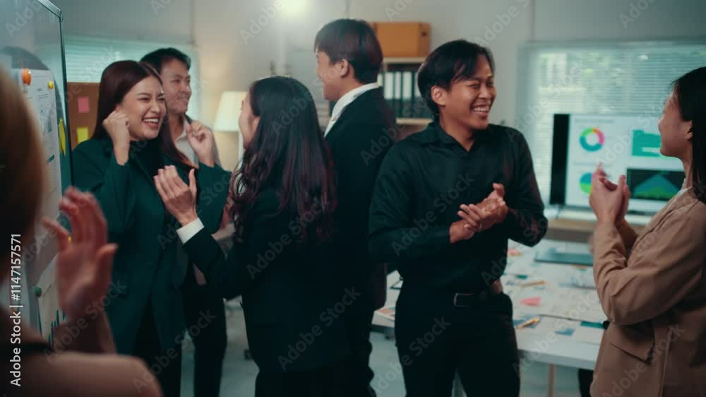 Aufkleber Diverse group of professionals clapping and cheering, expressing joy and satisfaction after a successful business presentation, demonstrating teamwork and achievement in a corporate setting