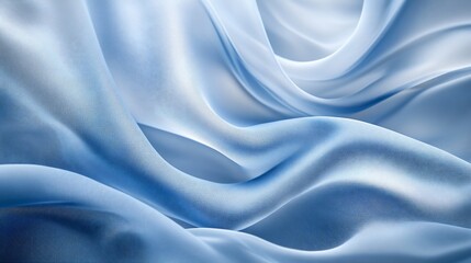 Fototapeta premium Delicate, flowing, light blue silk fabric drapes in soft, elegant folds. (1)
