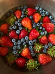 Obraz premium Berries being Cleaned in Water