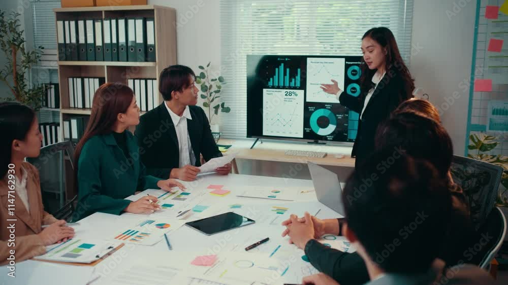 Poster business team analyzing financial data and company's performance during a meeting in the office, a b