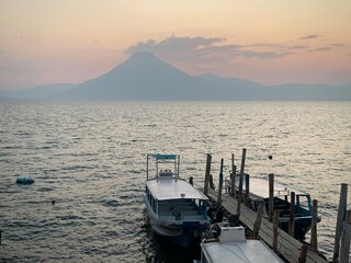 Docked Boats at Sunset with Volcano (Lake Atitlan, Guatemala)