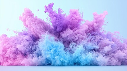 Fototapeta premium Abstract cloud of pink, purple, and blue ink swirling in water against a light blue background.