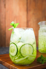 Shaved cucumber ice is a typical Indonesian drink, made from shaved cucumber, topped with syrup, basil and nata de coco. Ramadan food. Indonesian street food.