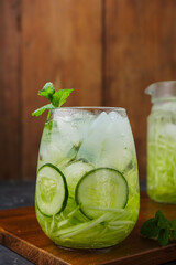 Shaved cucumber ice is a typical Indonesian drink, made from shaved cucumber, topped with syrup, basil and nata de coco. Ramadan food. Indonesian street food.