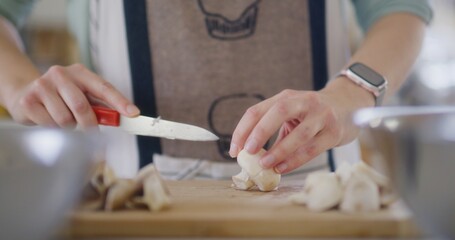 Woman Slicing Mushrooms Close-Up