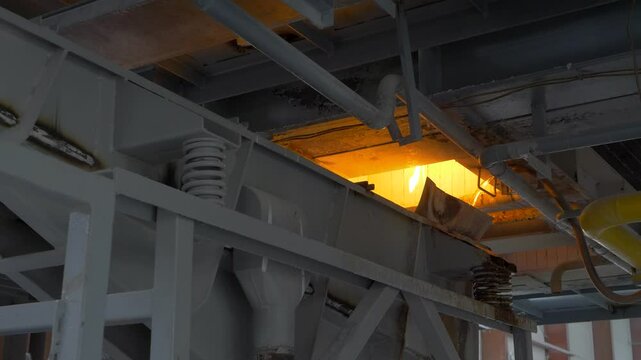 Heavy industrial enterprise plant for frit production. Ceramic composition formed by fusing inorganic materials into glass by heating them in smelters and quenching them in water
