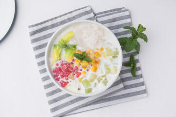 Mixed Ice, made from gelatin, tapioca pearls, ice, young coconut, sugar syrup, mixed fruit and coconut milk or milk. hemp during the month of Ramadan. Indonesian street food.