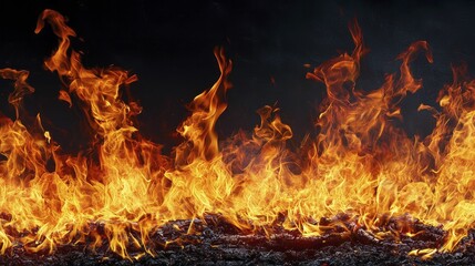 Flames dance in the shadows of the night, illuminating the darkness with fiery intensity.