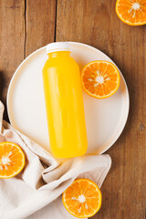 orange juice in a plastic bottle, for your beverage product mockup