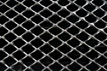 Car grill with foam close-up wallpaper. Exterior detail. Car wash.