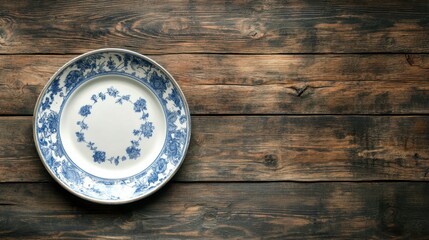 Fototapeta premium Vintage Decorative Plate on Rustic Wooden Table Background