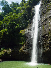 Obraz premium Alalum Falls with green plunge basin. Bukidnon, Philippines.