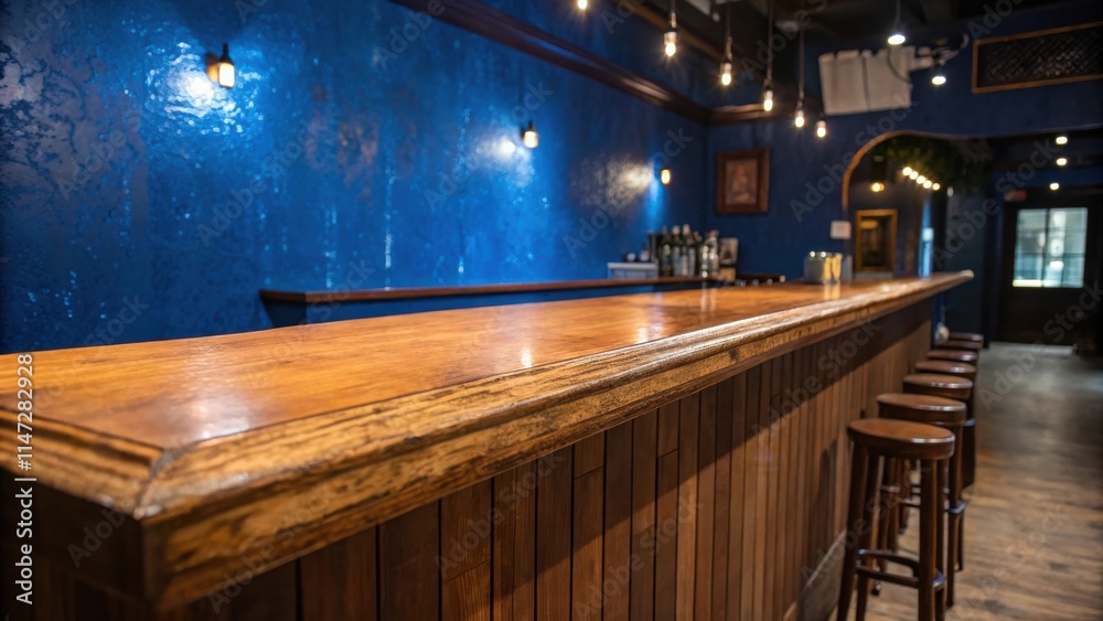 Poster a wooden bar countertop with a blue wall and a row of stools in the background.