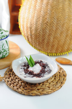 Bubur ketan hitam, bubur pulut hitam or bubur injun (English: Black sticky rice porridge