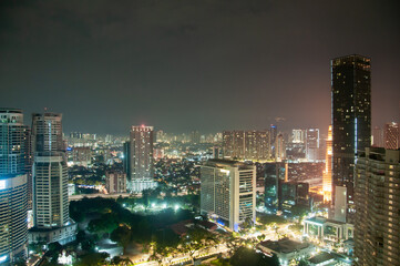 Naklejka premium tall buildings with morning clouds in the background