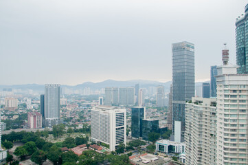 Obraz premium tall buildings with morning clouds in the background