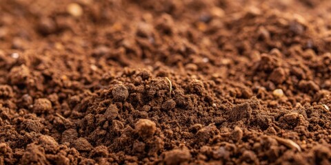 Inverted macro texture of dirt , soil, earth, ground, close-up, nature, background, organic, gritty, rough