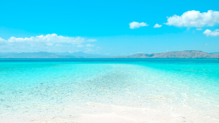 Beautiful tropical beach with white sand and blue sky. summer background and summer vacation concept