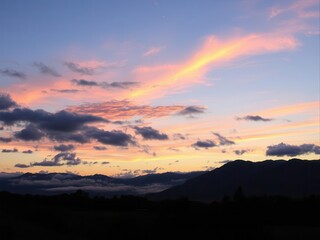 Obraz premium Vibrant sunset in a panoramic nature scene with mountains, picturesque, beautiful, countryside