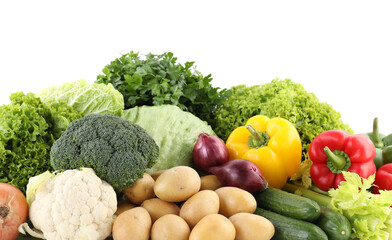 Many different ripe vegetables isolated on white