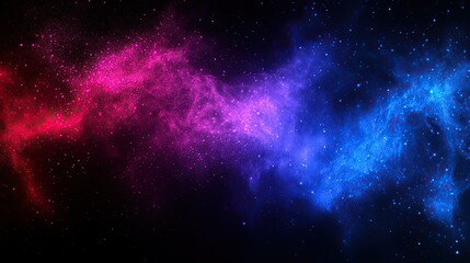 Colorful cosmic nebula displaying vibrant hues of pink and blue against a dark backdrop in the universe