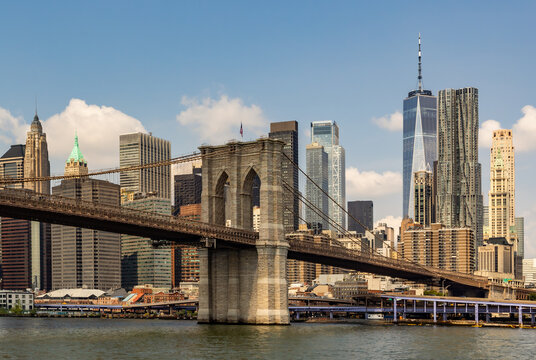 Brooklyn bridge and downtown NYC skyline. from the East River.