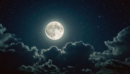 Fototapeta premium Full moon illuminating clouds and stars in bluish night sky