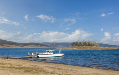  autumn landscape with island on lake Batak in Bulgaria